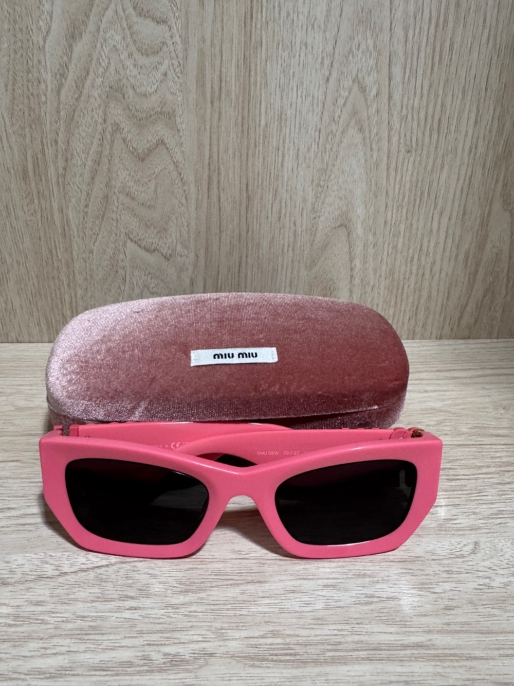 Miu Miu Hot Pink Cat-Eye Sunglasses with Dark Lenses
